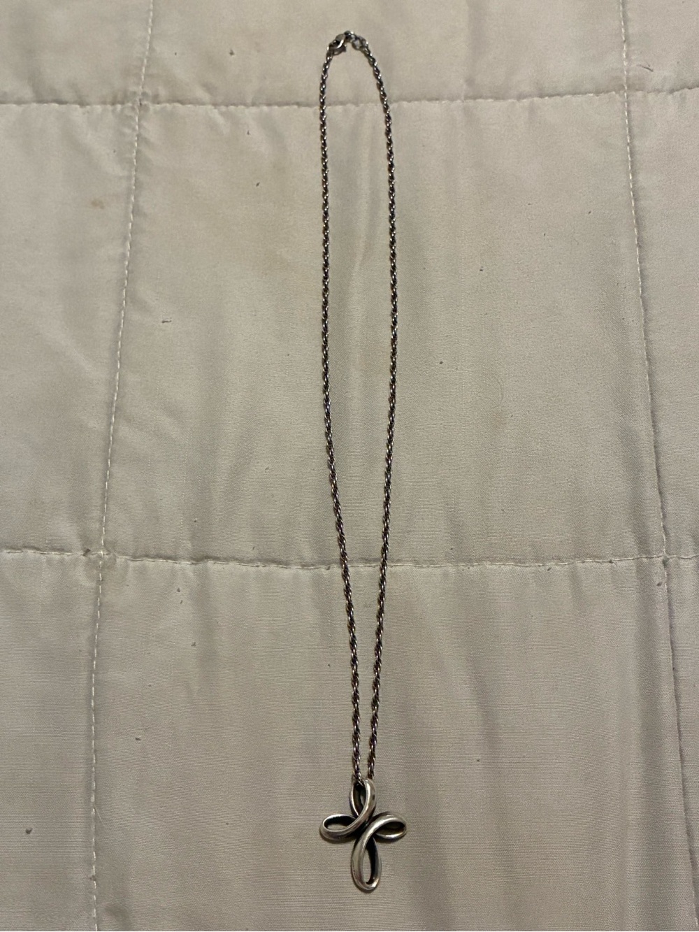 James Avery Eternal Ribbon Cross Pendant in sterling silver on a rope chain